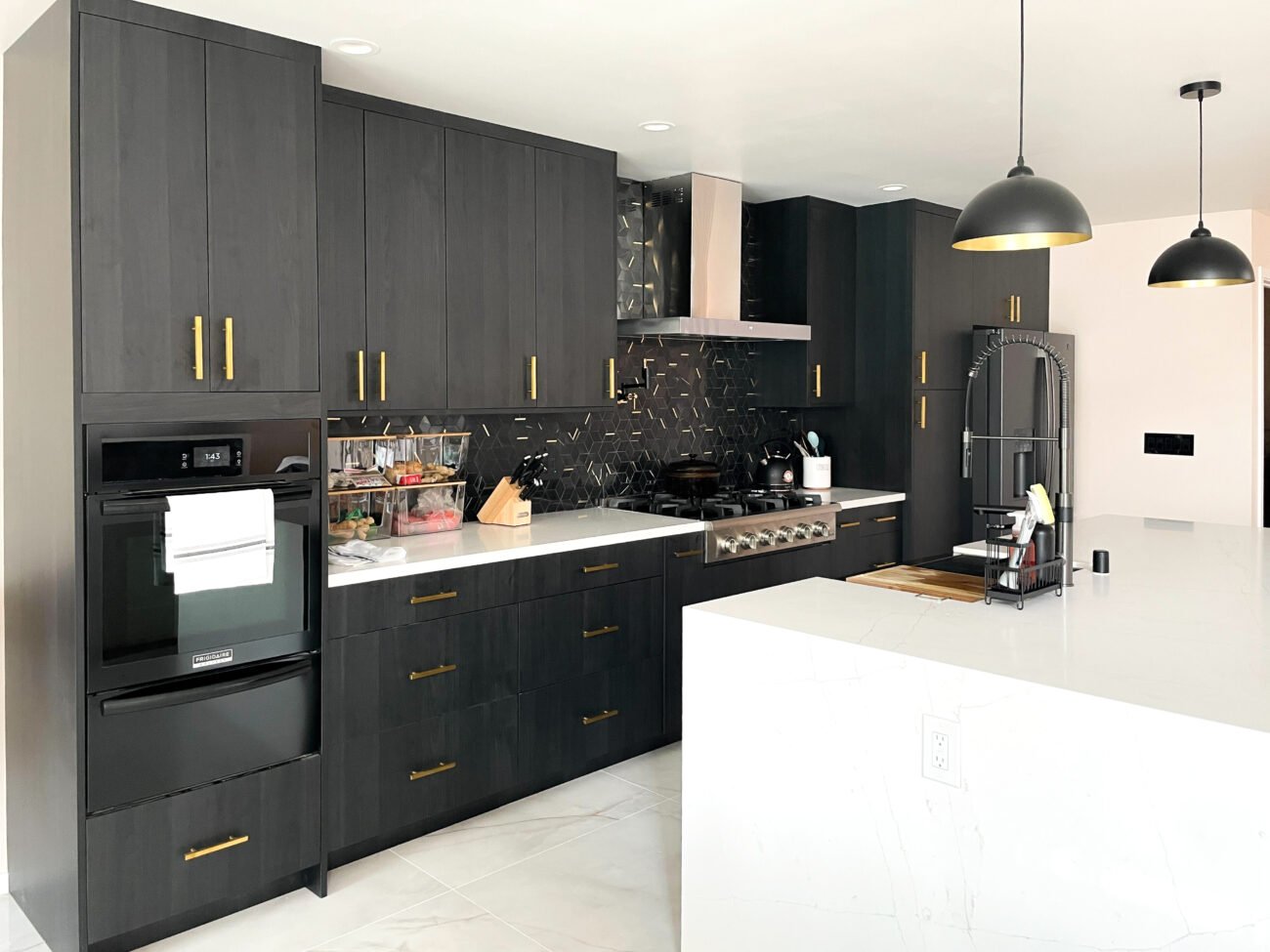kitchen with dark custom cabinets