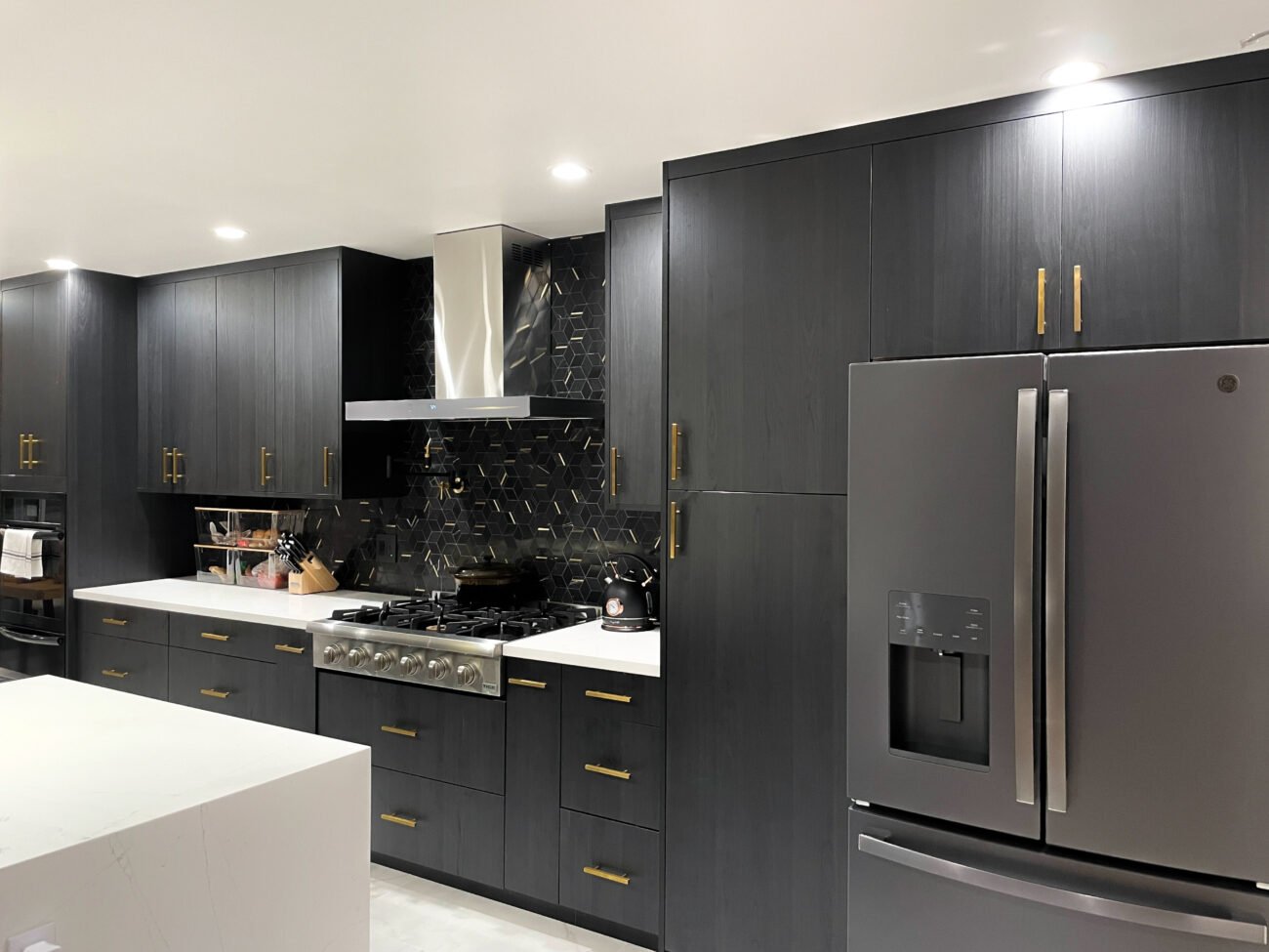 elegant modern kitchen with dark cabinets
