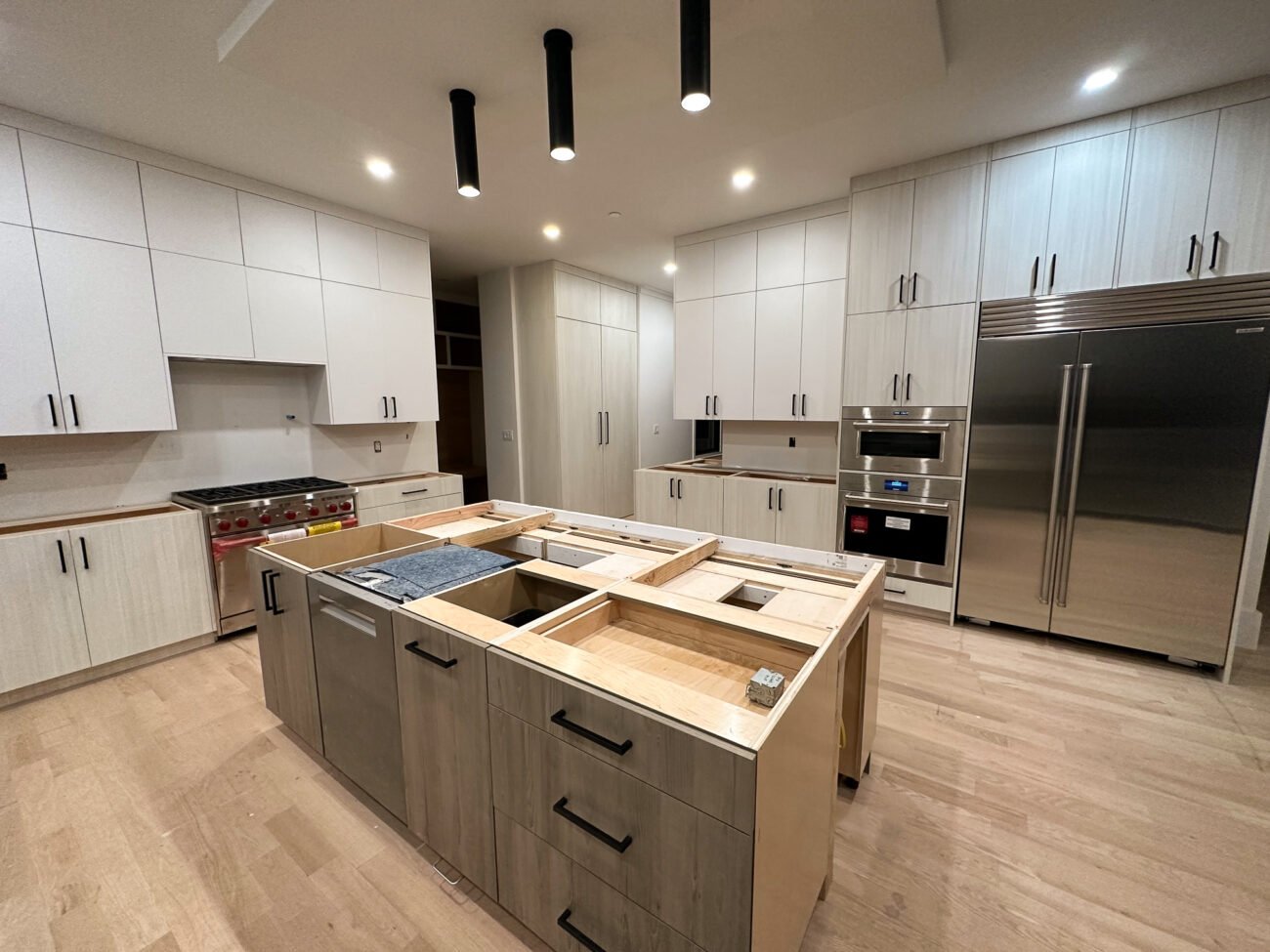 custom european-style cabinets in a new kitchen